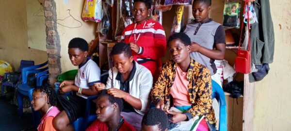 Young mothers -during aprenticiship training in hair dressing at Grace Saloon in Mahyoro, Kitahwenda District-12th March 2024-By Jetrace